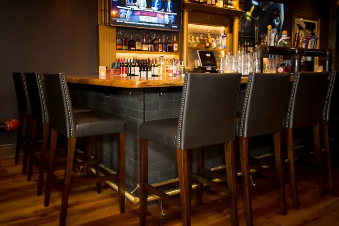 Bar with taps and televisions